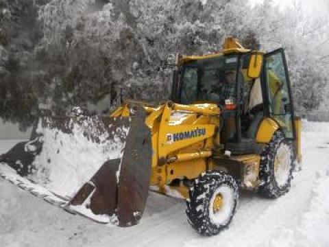 Buldoexcavator Komatsu