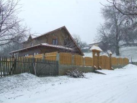 Casa pe structura din lemn + casa de caramida porotem