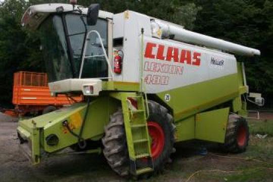 Combina Claas si John Deere