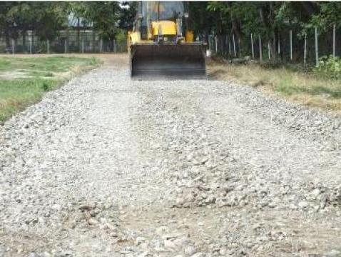 Inchiriere buldoexcavator constructii drumuri, parcari