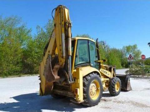 Planetara buldoexcavator Komatsu WB97R