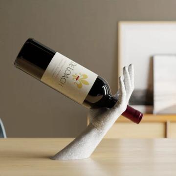 Suport Hand Gravity pentru sticla de vin
